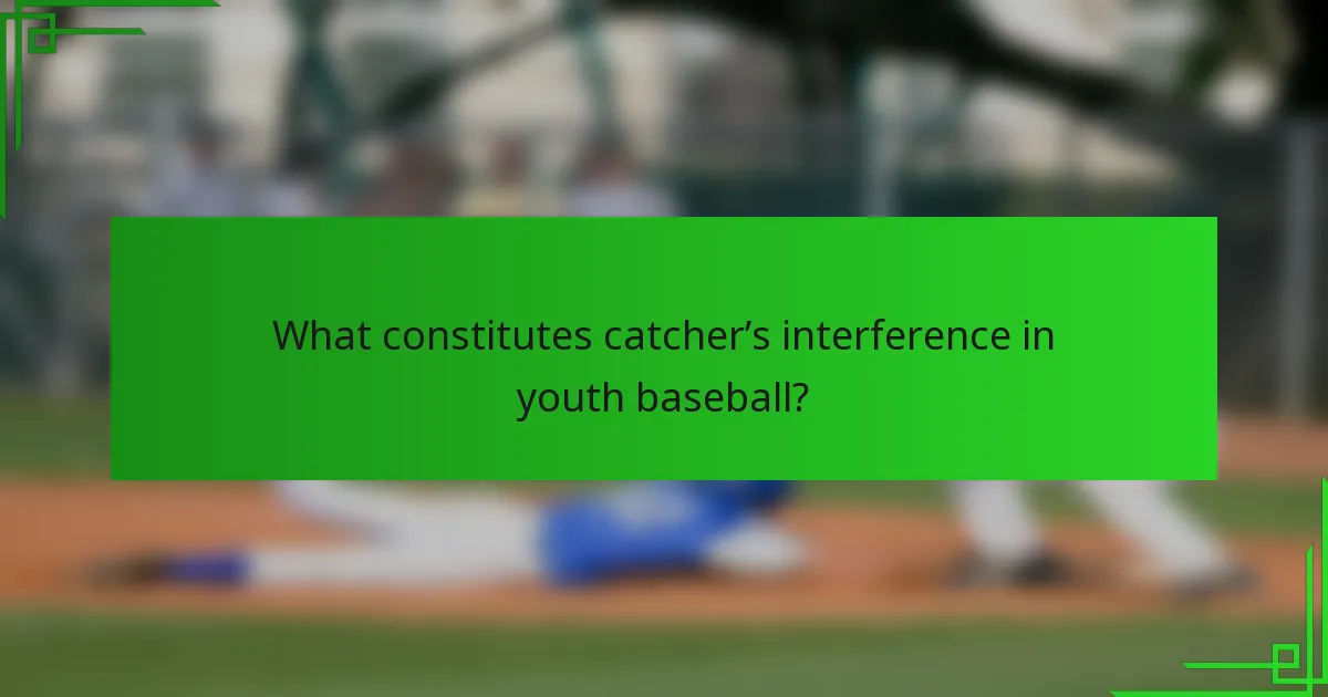 What constitutes catcher’s interference in youth baseball?